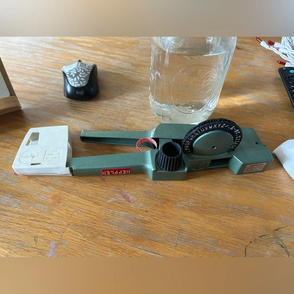 Apsco label maker with two rolls of red tape